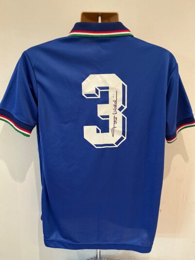Maldini Signed Italy Football Shirt: Large retro shirt of a blue home Italy shirt. Signed on the number 3 to rear by Paolo Maldini.