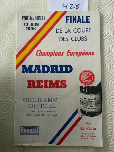 1956 European Cup Final Football Programme: Very rare 1st ever final between Real Madrid and Reims. Very good condition with no team changes. Slightly visible cup mark to cover if you look very closely. C/W France Football paper which has a review of the game which is in a lesser condition. (2)
