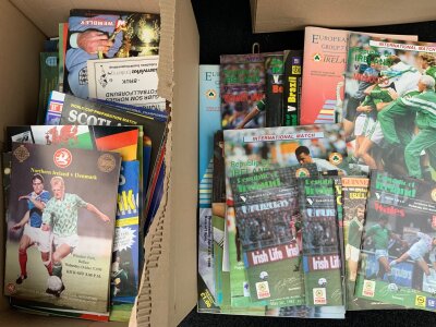 England + Home Nations Football Programmes: Large box containing many programmes from Scotland Wales Northern Ireland Eire and a few England. Quantity with instructions to sell.