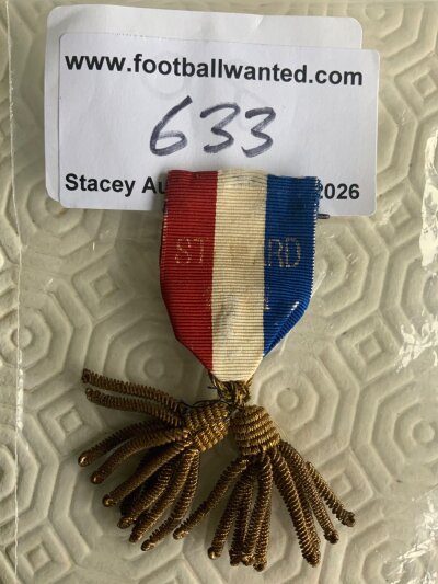 1911 England International Stewards Badge: Red white and blue cloth pin badge with words Steward 1911 fading. We are informed this is a stewards badge for an England International but it is not evident from item.