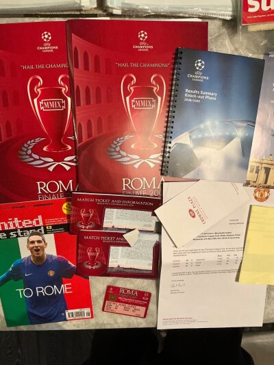 2009 Champions League Final Barcelona v Manchester United Football Memorabilia: Ticket in form of a credit card with receipt from Manchester United. United We Stand Rome Edition, Champions League final magazine, Tour guides, Newspapers, Press packs including original team sheet and more.