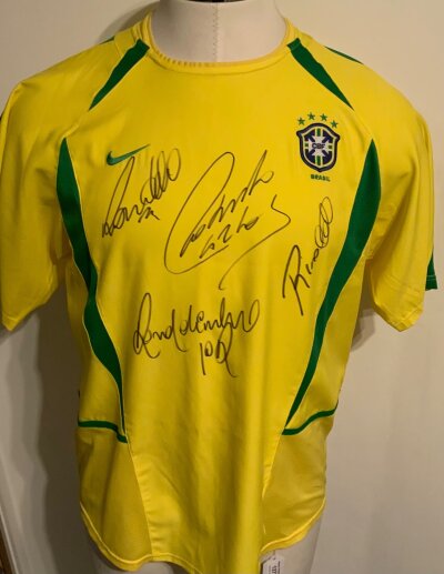 Brazil Signed Football Shirt: 2092 yellow short sleeve shirt signed by 4 including Rivaldo Ronaldo and Ronaldinho.