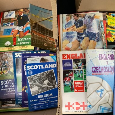 England + Home Nations International Football Programmes: Large quantity in excellent condition of England Northern Ireland Wales and Scotland programmes in box with instructions to sell.