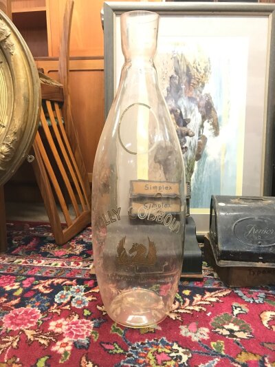 A large glass Tolly Cobbold vase. 62cm tall NO RESERVE