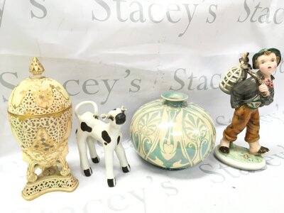 Ceramics including a porcelain Austrian figure of a boy , mother of pearl glaze vase, Worcester lidded vase and a cow figure. 15 to 25cm tall NO RESERVE