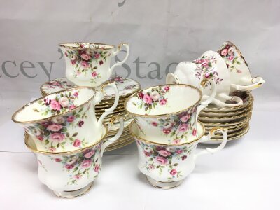 A collection of Royal Albert tea ware in Cottage Garden and Lavender Rose pattern.