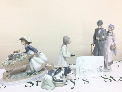 Lladro and NAO porcelain figures including Barrow of Fun, twilight years , bashful bather