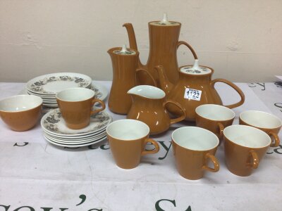 A Poole pottery Mid 20th century design tea and coffee set with large side plates. No obvious damage.