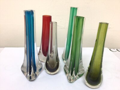 A collection of mid 20th century design coloured art glass vases some Whitefriars. (6)