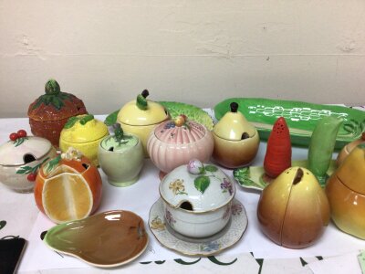 A collection of decorative novelty preserve jars and cruet set and other dishes.