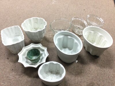 A box of ceramic jelly moulds