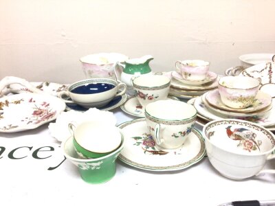 A Collection of George Jones Edwardian porcelain comprising cups saucers trios hors d’oeuvre dishes compotes and other ceramics.