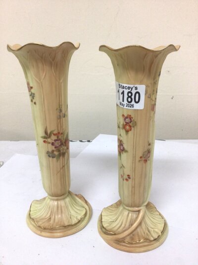 A Pair of Royal Worcester vases of naturalist form hand painted with flowers marks to the base. Height 23cm