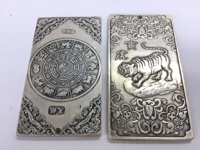 Two Chinese dragon ingots pendant silver style, approx 9.5cmx5cm total weight 260 grams