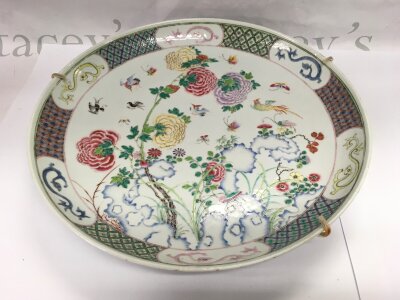 A 19th Century Chinese export porcelain circular wall plaque, slight chips to rim. Approx diameter 35.5cm.