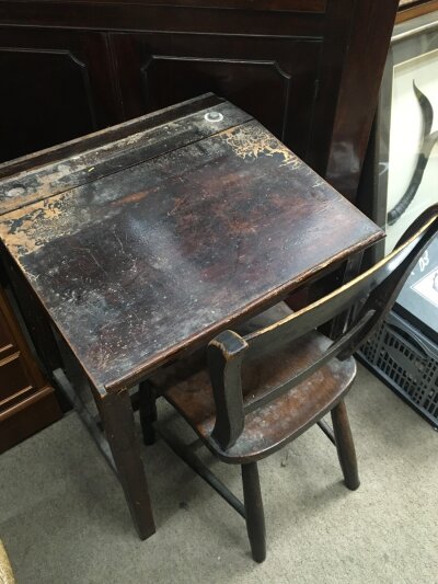 A wooden child's school desk, dimensions 65cm tall,53cm wide 45cm long.  NO RESERVE