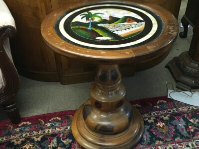 A Brazilian table ,the top with butterfly wings. 62cm tall 54cm wide
