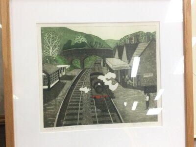 A limited edition print Weyborne railway station by John Brunsden 2/150. Frame dimensions 50x48cm