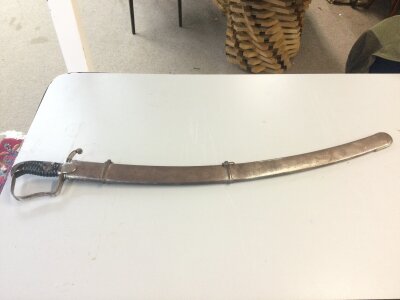 A 1976 Light Cavalry sword . 95cm total length 82cm blade length