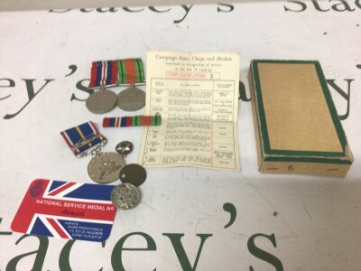 A British National Service Medal and two II world war medals.