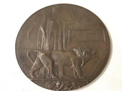 A death plaque inscribed Peter Graham , 12cm wide