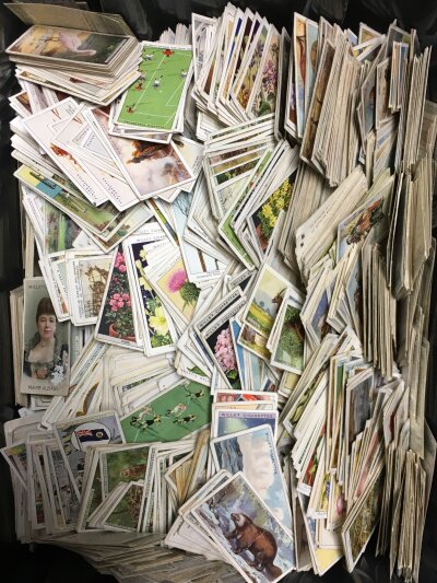 A mixed collection of cigarette cards including Wills, Players