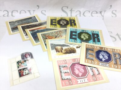 Unused Queen Elizabeth II silver jubilee commemorative stamps 1952-1977 picture card series and R. Mail Wintertime picture series