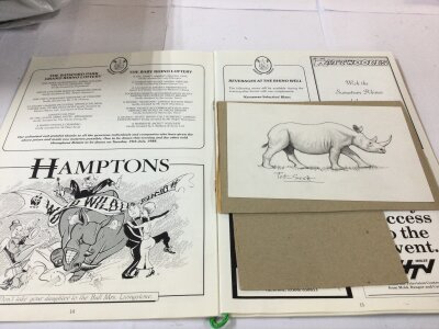 A Peter Scott signed pencil drawing of a rhino and a Batsford Park Rhino ball programme 1988 WWF album