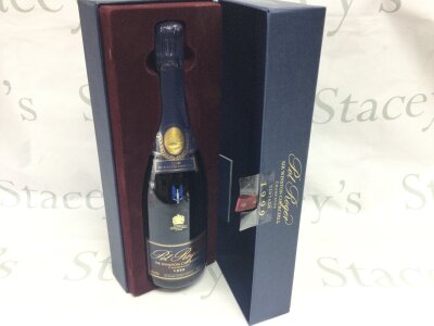 A cased bottle of Pol Roger Sir Winston Churchill Champagne from 1999.