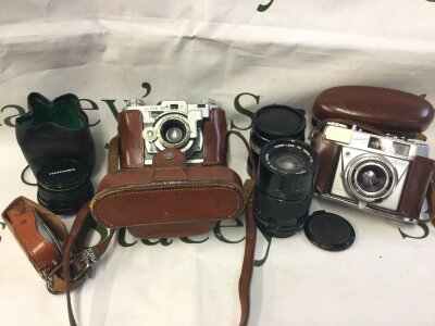 Vintage cameras including Kodak 23, Retinette II B, canon 135mm lens,