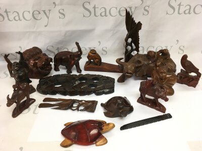 A collection of ornamental wood carvings including water buffalo, elephant etc. NO RESERVE
