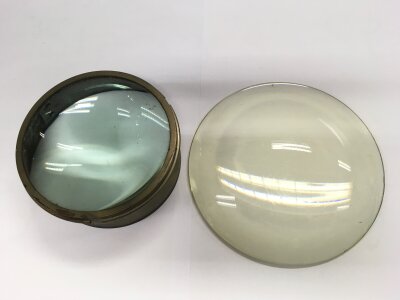 Two early magnifying lenses, one convex, one concave. Approx width 20cm and 15cm. NO RESERVE
