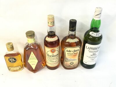 Five bottles of assorted whiskey including Isle of Jura, Oban etc