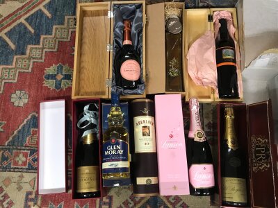 A Collection of wines and whiskeys including Fortum and Mason 1990 champagne, Glen moray single malt whisky, Laurent Perrier, Florarska Rihta, Pol Roger champagne