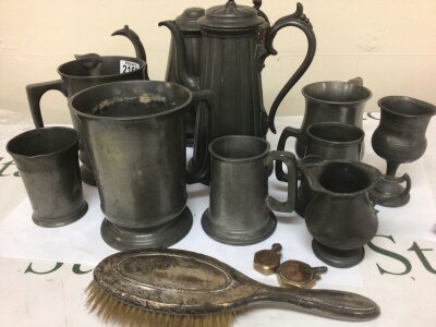 A Collection of Antique Pewter a silver hand brush and two trench art type lighters set with a penny dated 1938 and 1941 possibly II world war trench art.