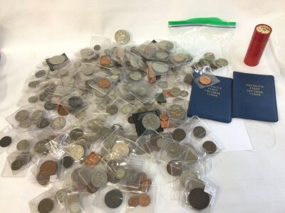 A large collection of assorted coinage including both pre 1920 and 1947 examples