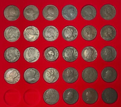 A collection of half penny coins 1721 onwards. Various high definition examples. (2 trays)