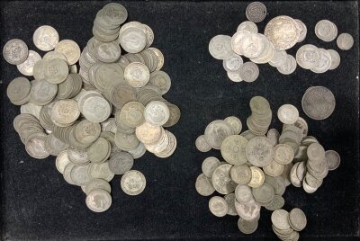 A large collection of pre 1947 silver coinage, approximately 1400g
