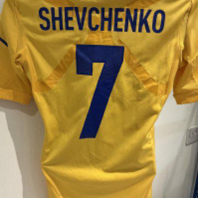 Ukraine 2012 Shevchenko Match Worn Football Shirt: The Adidas yellow 7 short sleeve was worn by the Ukrainian former professional football player Andriy Shevchenko in a friendly match during the 2012 season with his national team. Shevchenko is considered one of the greatest strikers of all time and Ukraines greatest ever player. He is the all-time top scorer for the Ukraine national team with 48 goals. The shirt features the name Shevchenko and 7 applied on the back. A smaller 7, Adidas logo, and the National Team crest are applied on front. Two pairs of adidas blue stripes are applied on the shoulders. The jersey has a unique white rubber band around the lower hem. Sized Medium.