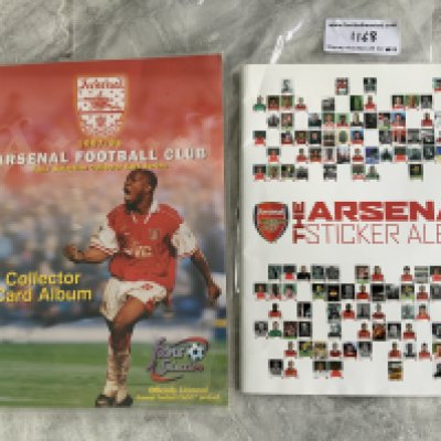 Arsenal Football Card Complete Albums: Arsenal sticker album from 2013/2014 complete and to include current team, legends, pictures of the stadium, Invincibles, 1989 league winning team etc. Other album is the 97/98 collector card album complete with check list made by Futera. (2)