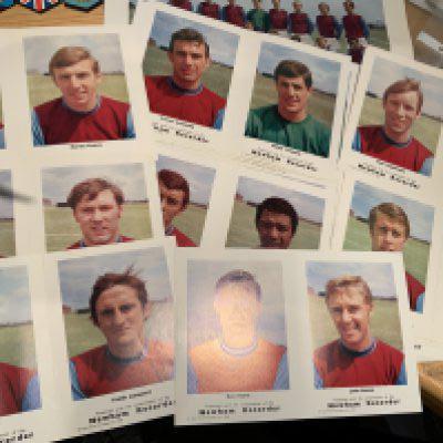 West Ham Newham Recorder 1960s Player Card Set: Full set of 16 Player Portraits which have two pictures per card and many spares. C/W two each of Babs Bobby Moore and West Ham badges, Newham Recorder 68/69 calendar poster with team group and fixtures, 1964 team group and some handbooks and more.