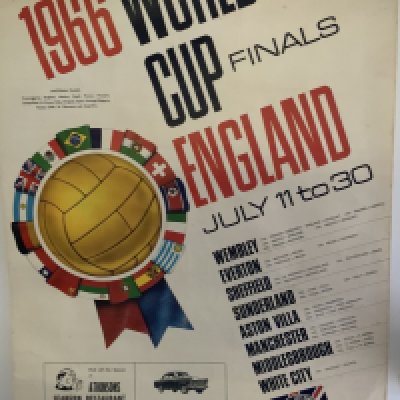 1966 World Cup Football Poster: Very large original 29 x 20 inch poster by Carvosso in good condition with metal either end for displaying at stations etc. Attractive with venues and fixtures, participating teams flags and World Cup logo.