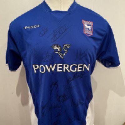 2003 - 2004 Ipswich Town Signed Football Shirts: Home and away large shirts signed by the squad to both. Genuine autograph given to well known Ipswich scout. (2)