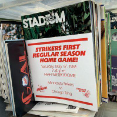 North American Football Programmes: Wide range of clubs from the 80s with many top ex Division One players including Beardsley Lorimer Weller Keegan Shilton Kidd and Villa. (Box)