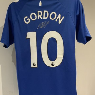 Everton Gordon Signed Replica Football Shirt: Hummel short sleeve name and number shirt with tags signed to rear by the player with an additional two signatures to the front.