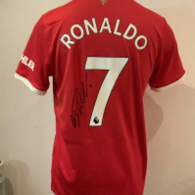 Cristiano Ronaldo Signed Replica Manchester United Football shirt: Red Adidas shirt signed to the reverse in size Large. Creasing and light general wear, some minor stitching irregularities.