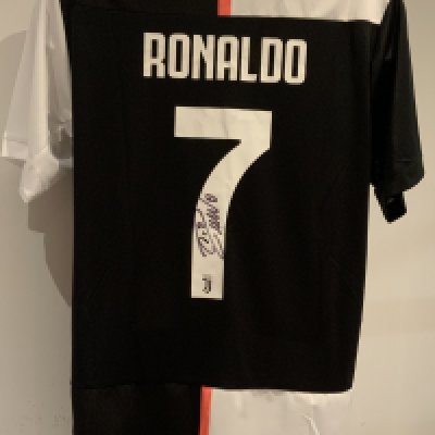 Ronaldo Juventus Signed Football Shirt: Adidas short sleeve shirt with tags signed to rear. Good condition.