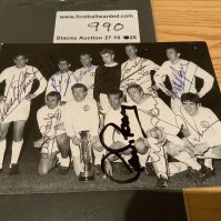 Leeds United 1968 Fairs Cup Winners Signed Postcard: Pictured on the pitch with the cup is all eleven winning players. Everyone hand signed without dedication except Bremner.