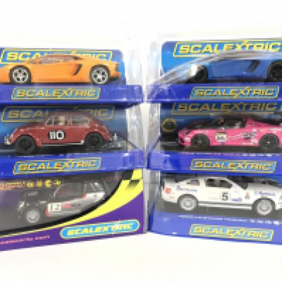 6 X Boxed Scalextric Cars.including Lamborghinis. A Ford Mustang. A Volkswagen Beetle and a Mini.