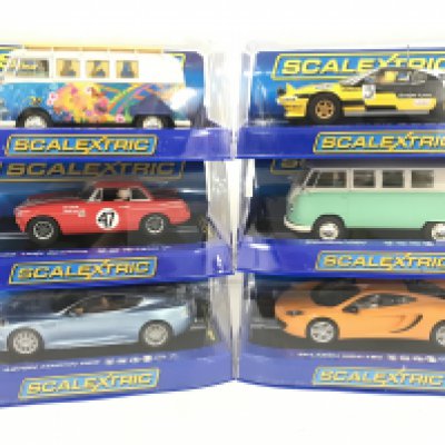 6 Boxed Scalextric Cars. Including 2 X Volkswagen Camper Vans. A Aston Martin DBS. A MG 1964 Searing. A Ferrari 308 GTB and a McLaren MP4-12C.